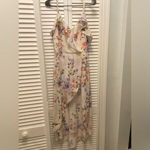 Tan and floral dress , built in shorts , off the shoulder